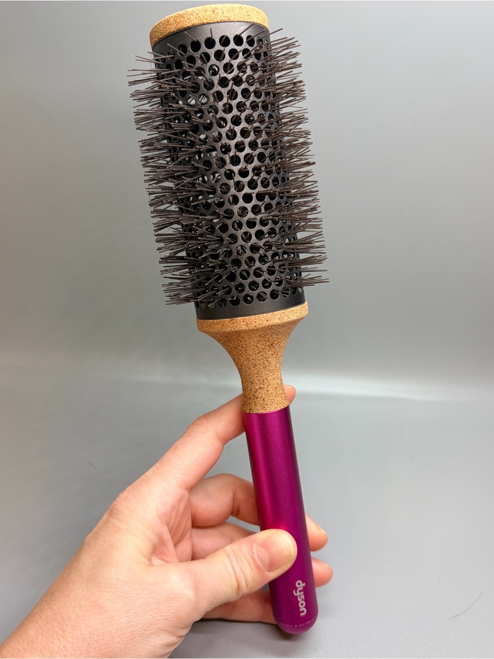 Dyson fuchsia round vented styling brush with cork grip
